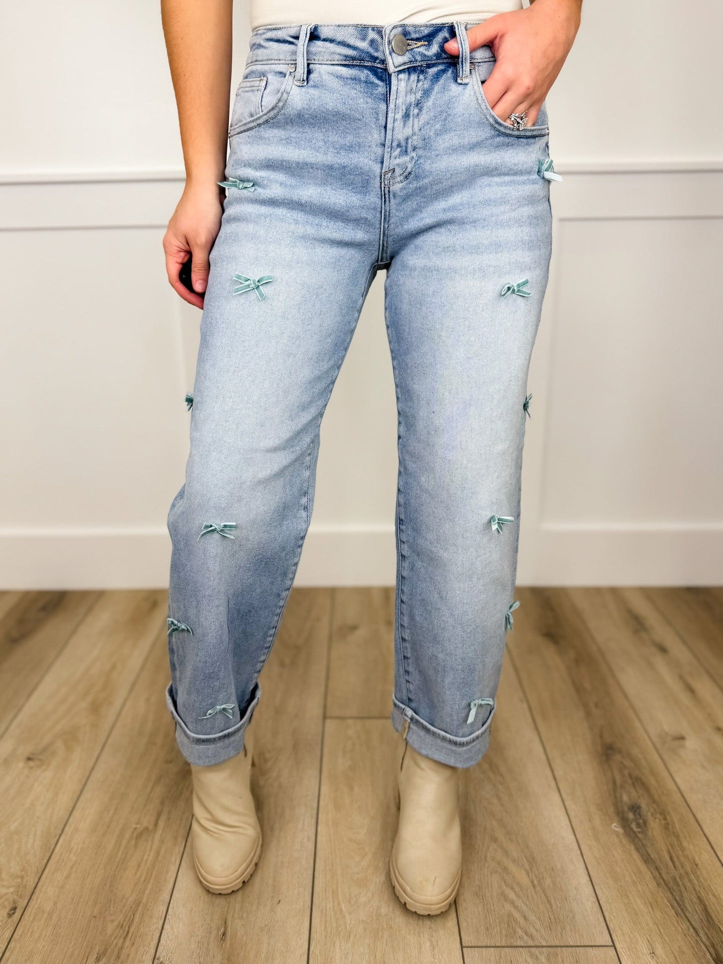 Risen Cassidy High-Rise Barrel Leg Bow Detail Light Wash Cropped Blue Jeans